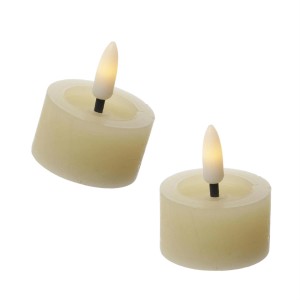 Zwei creme Echtwachs LED Teelichter mit rustikaler Optik und warmweißem Licht.