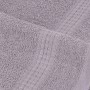 Graues, weiches Baumwoll-Handtuch mit saugfähiger Frottier-Textur und dekorativer Webkante. 100% Baumwolle.