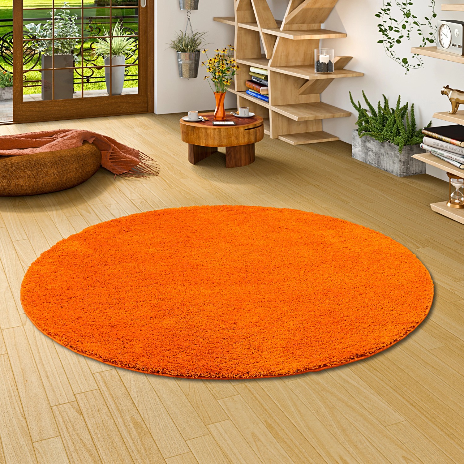 Runder, orangefarbener Snapstyle Hochflor Shaggy Teppich Palace, 160x160cm, im Wohnraum.