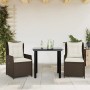 3-teilige Garten Essgruppe aus braunem Poly Rattan mit Tisch und 2 Stühlen mit cremefarbenen Kissen.