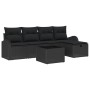 Schwarzes 6-teiliges vidaXL Garten-Sofa-Set aus Poly Rattan mit Kissen und Tisch.