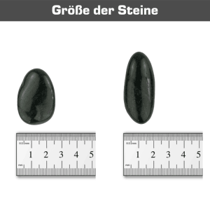 Zierkies schwarz poliert: Zwei Kieselsteine (2-3 cm) mit Lineal zur Größenansicht.