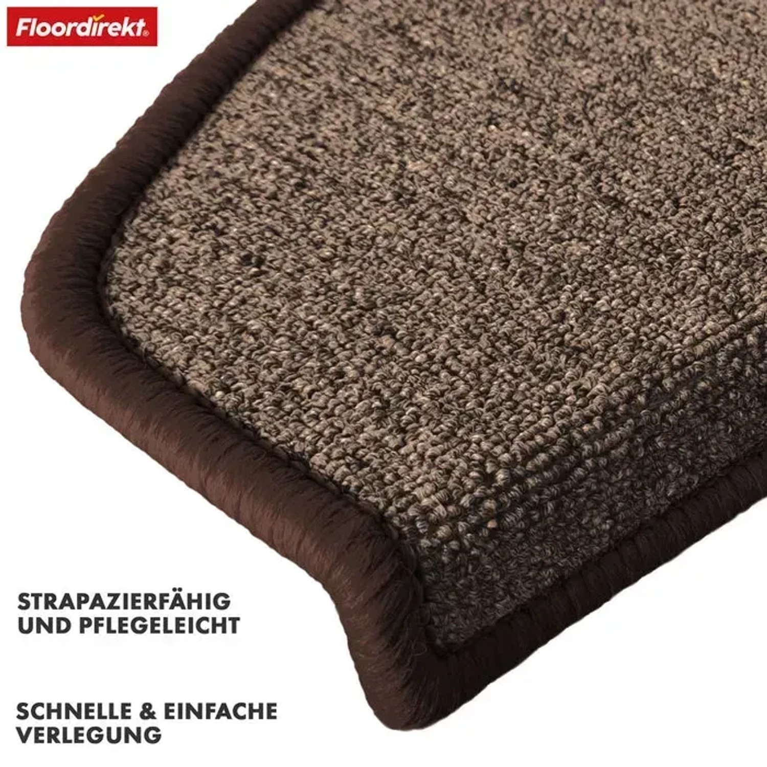 Detailaufnahme: Halbrund braune KARAT Stufenmatte London Pro, Teppichstruktur mit geketteltem Rand.