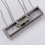 Detailansicht der Lindby Simeon Pendelleuchte (4-flammig) in Alu/Glas, zeigt die Innenseite der Leuchte.