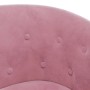 Detailaufnahme: Rosa Clubsessel mit Knopfheftung und Fußhocker.