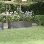 Graues vidaXL Hochbeet aus pulverbeschichtetem Stahl mit blühenden Hortensien im Garten.