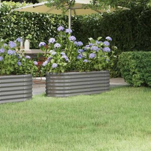 Graues Furnicato Hochbeet aus verzinktem Stahl, 114x40x36 cm, mit blühenden Pflanzen im Garten.