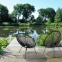 2er Set Garden Pleasure Relaxsessel Dalida, schwarze Gartenstühle mit Seilbespannung vor Teich.