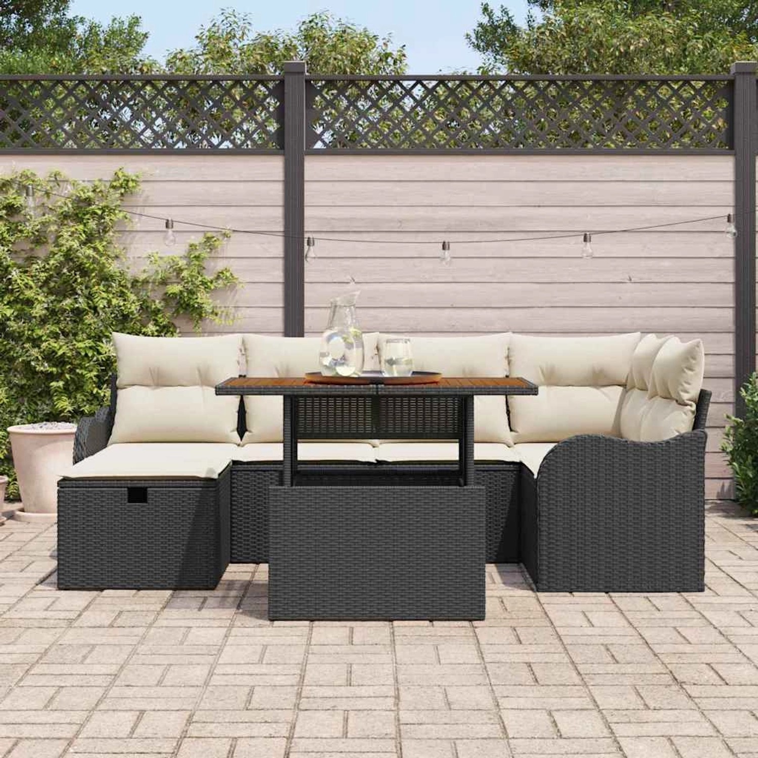 Schwarzes 7-tlg. vidaXL Garten-Sofa-Set aus Poly Rattan mit Tisch und beigen Polstern.