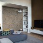 Wohnraum mit grauer Rasch Vliestapete Factory IV 428216 in Fliesenoptik.