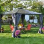 Canopia Gartenpavillon Palermo 3.6 x 3.6 Anthrazit mit Vorhängen und Gartenmöbeln im Grünen.