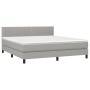 Hellgraues vidaXL Boxspringbett 180x200 cm mit Matratze und Kopfteil.