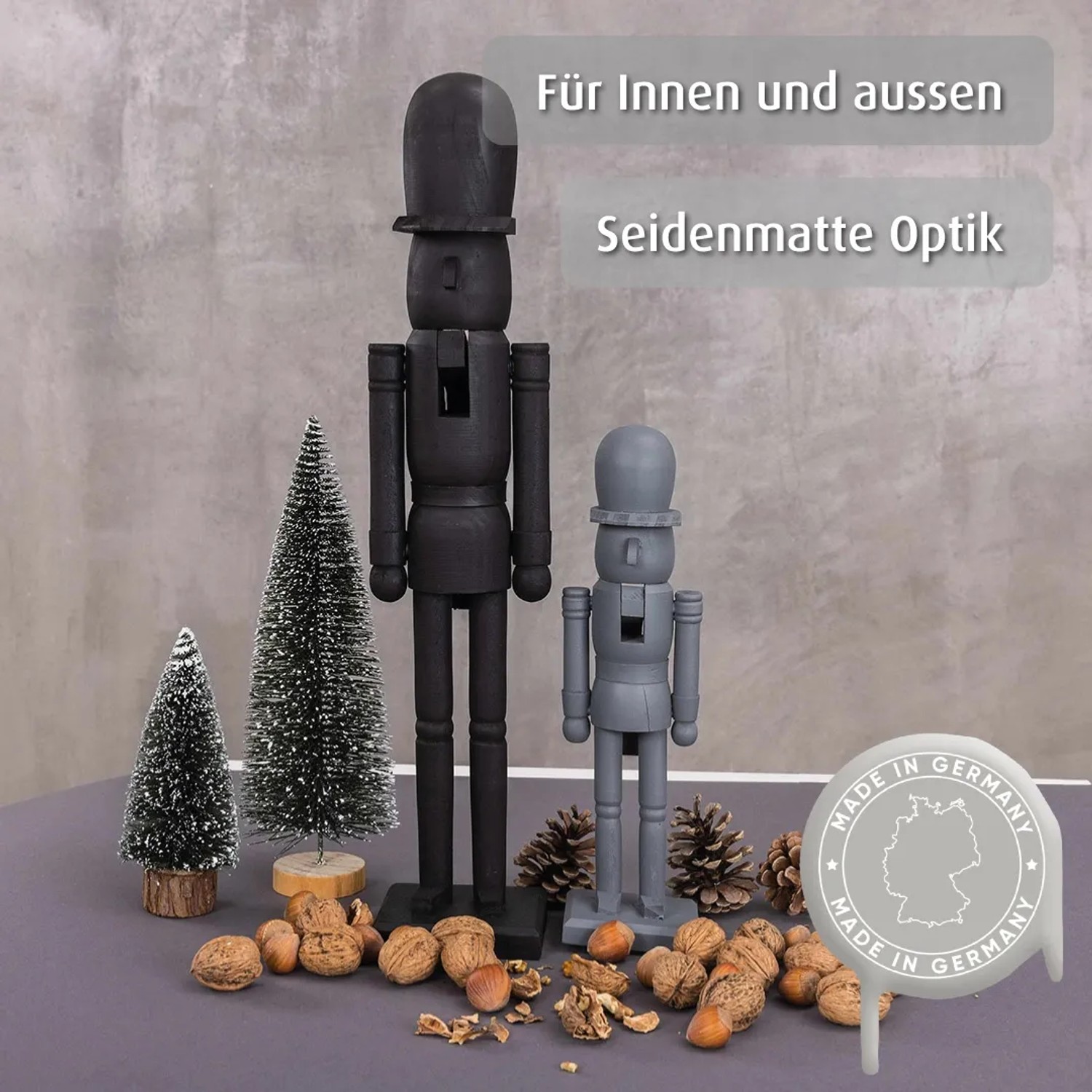 belton Buntlack Graphite Grey seidenmatt: Zwei Nussknackerfiguren in Grau und Anthrazit.