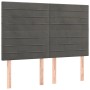 Dunkelgraues vidaXL Boxspringbett mit Samt-Kopfteil und Holzfüßen.