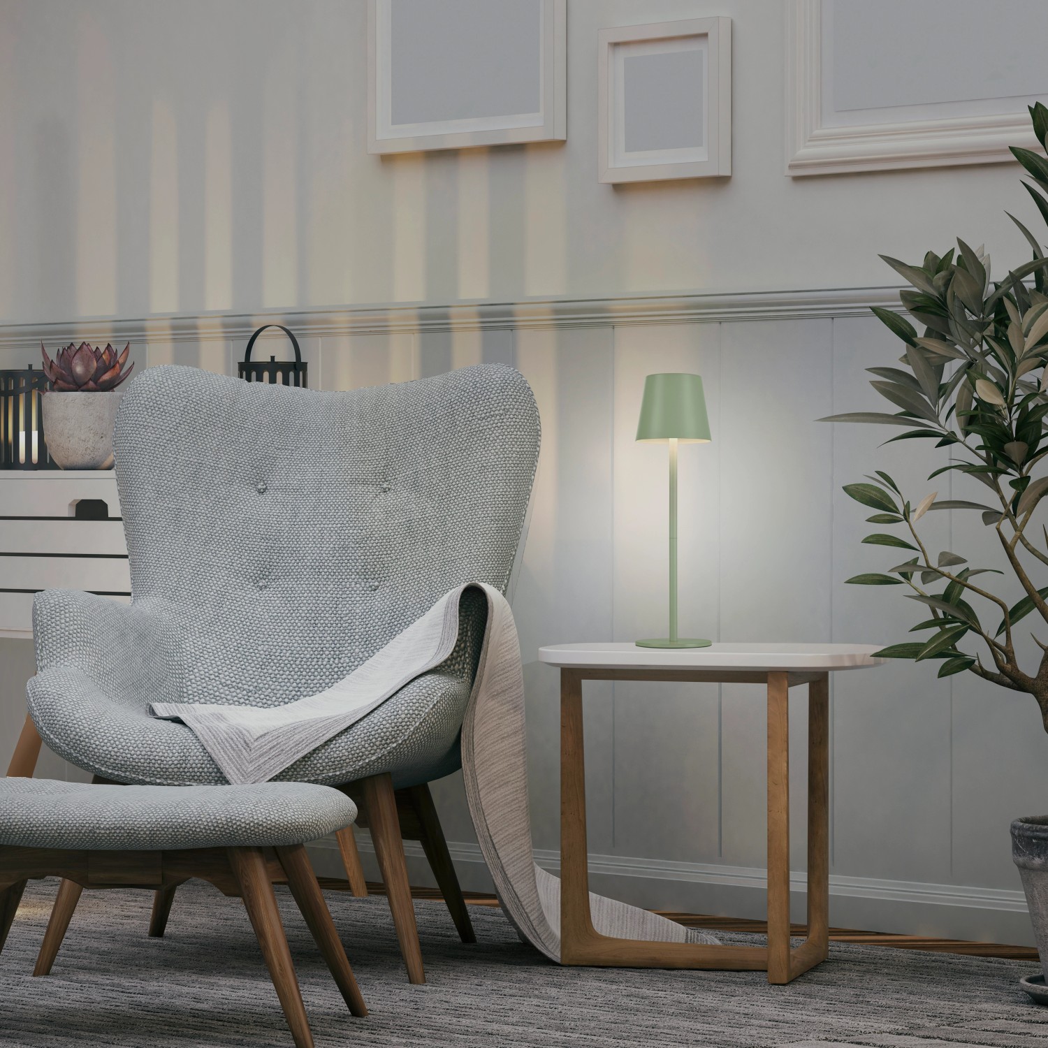 Grüne LED-Akku-Tischleuchte Euria von Just Light, 37 cm hoch, auf einem Beistelltisch im Wohnzimmer.