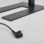 Detailaufnahme: Schwarze Arcchio LED Bürostehleuchte Logan, U-förmiger Fuß und Stecker.