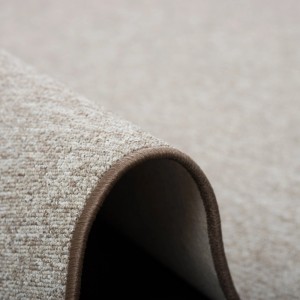 Detailaufnahme: Feinschlingen Teppich Strong Taupe (160x200cm) mit brauner Kettelung.