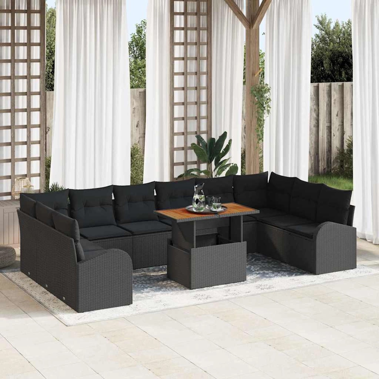 Schwarzes 11-teiliges vidaXL Garten-Sofa-Set mit Stauraum aus Poly Rattan und Tisch.
