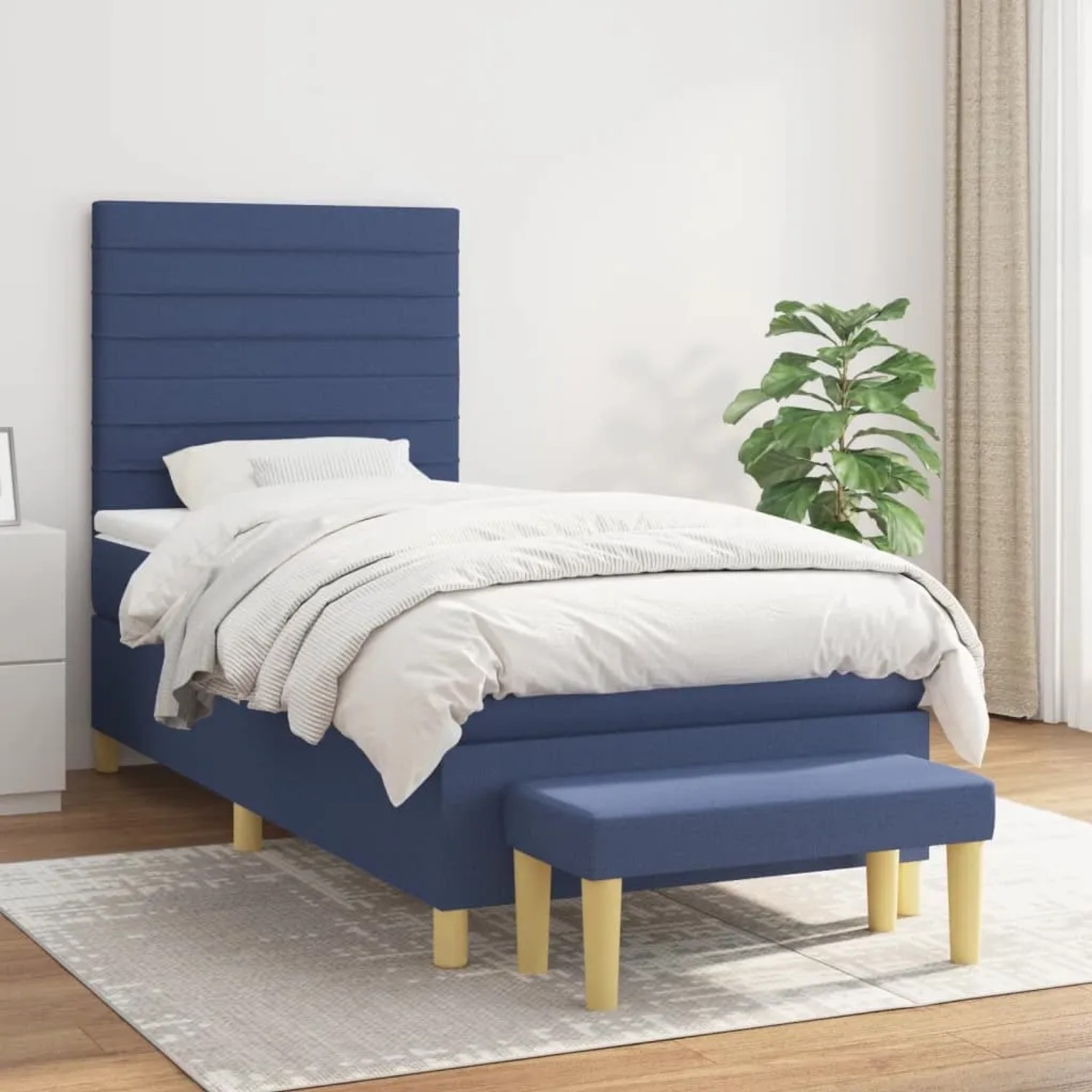 Blaues Boxspringbett (90x200 cm) mit Matratze, Kopfteil und Bank. Stoffbezug.