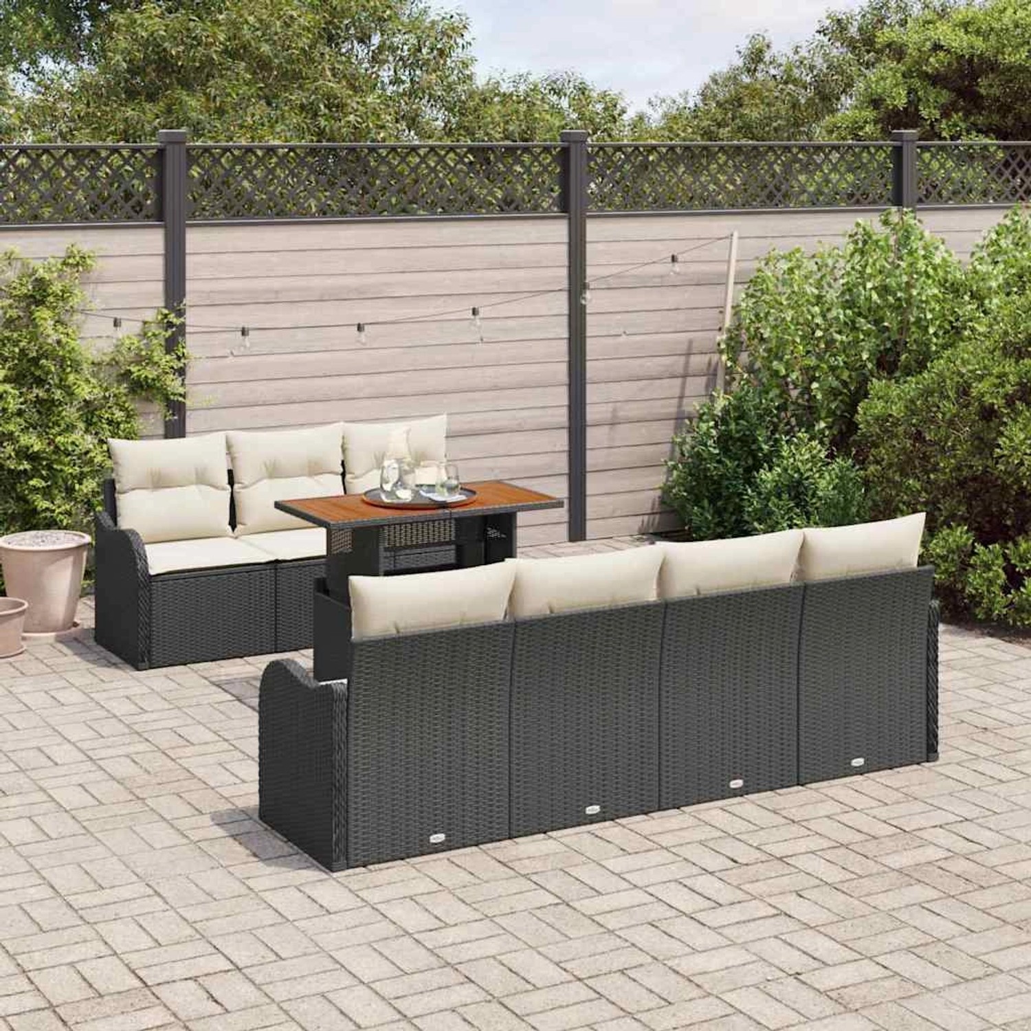 vidaXL 8-teiliges Garten-Sofa-Set aus Poly Rattan in Schwarz mit Tisch und Kissen.