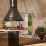 Innenansicht der Palmako Grillkota Eva, ein Holz-Gartenhaus mit Grilltisch und Esse.