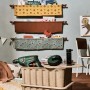 Bosch Atino Linienlaser mit Zubehör auf Tisch in Kinderzimmer-Szene.