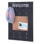 Dunkelgraue MCW Wandgarderobe im Shabby-Look mit Pinnwand und Haken.
