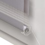 Graues Sol Royal Doppelrollo SolDecor DL2 am Fenster mit Klemmträger.