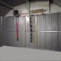 Spacemaker Werkzeughalteleisten Set im Gerätehaus mit Werkzeugen wie Schaufel, Rechen, Säge.