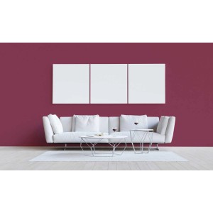 Wohnzimmer mit lila Tadessi Unitapete, weißem Sofa und Deko.