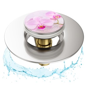 Sanilo Pop Up Waschbeckenstöpsel Blooming mit Orchideen-Motiv, Chrom und Messing.