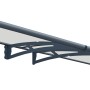 Palram Canopia Aquila 4.5 x 0.9 Vordach in Anthrazit mit klarer Acrylglas-Eindeckung.