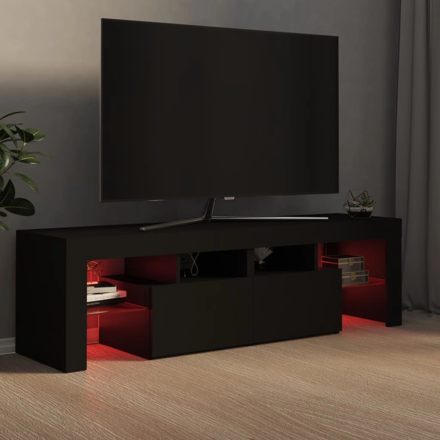 Schwarzer VidaXL TV-Schrank mit LED-Beleuchtung, 140 cm breit, Teil der Wohnwand.