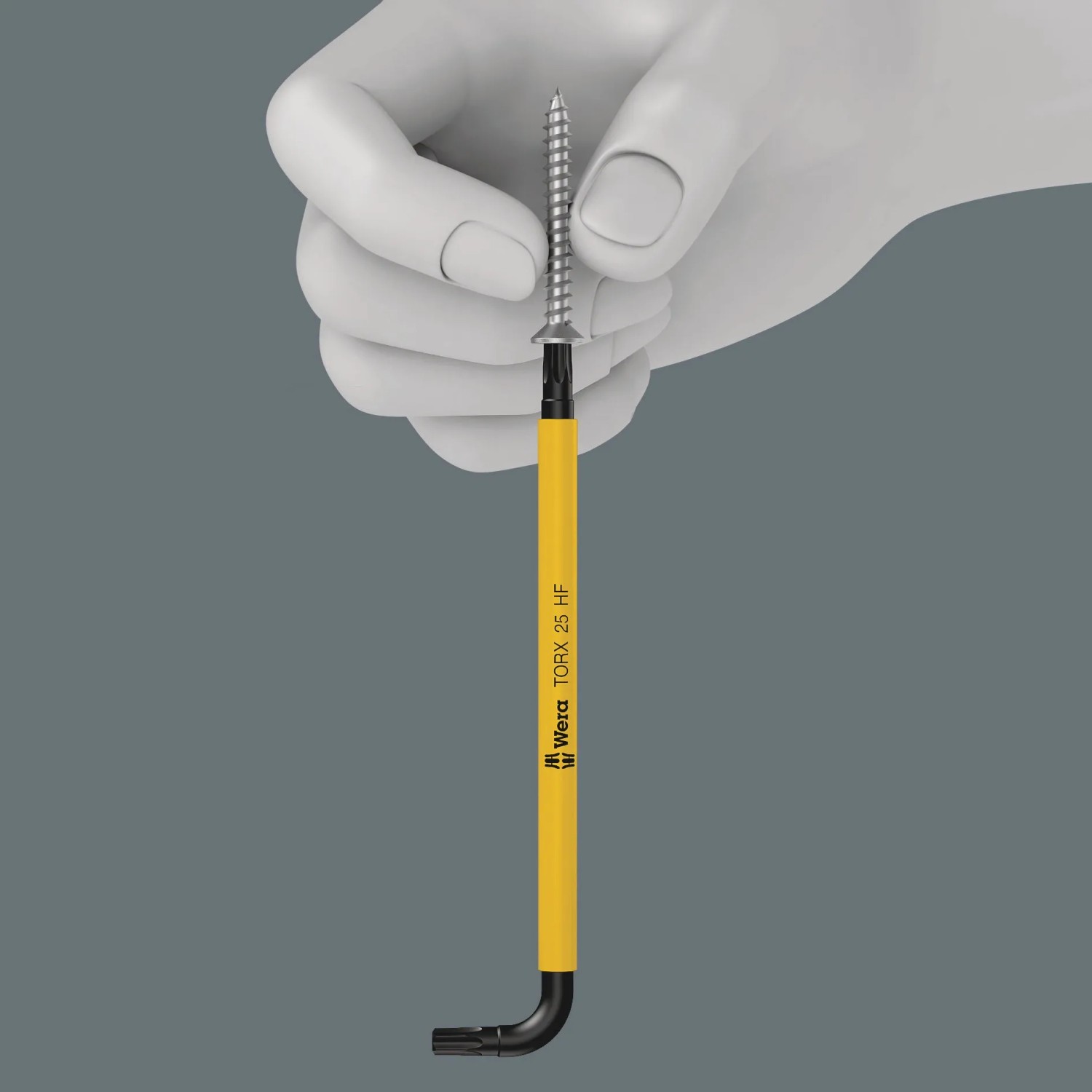 Wera Winkelschlüssel Torx TX 25 HF mit Schraube in Hand, gelb/schwarz, aus Schraubendreher-Kategorie.