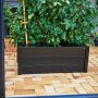 Schwarzer Juliana Pflanzkasten (37x55x95cm) mit Tomatenpflanze im Gewächshaus-Zubehör-Look.