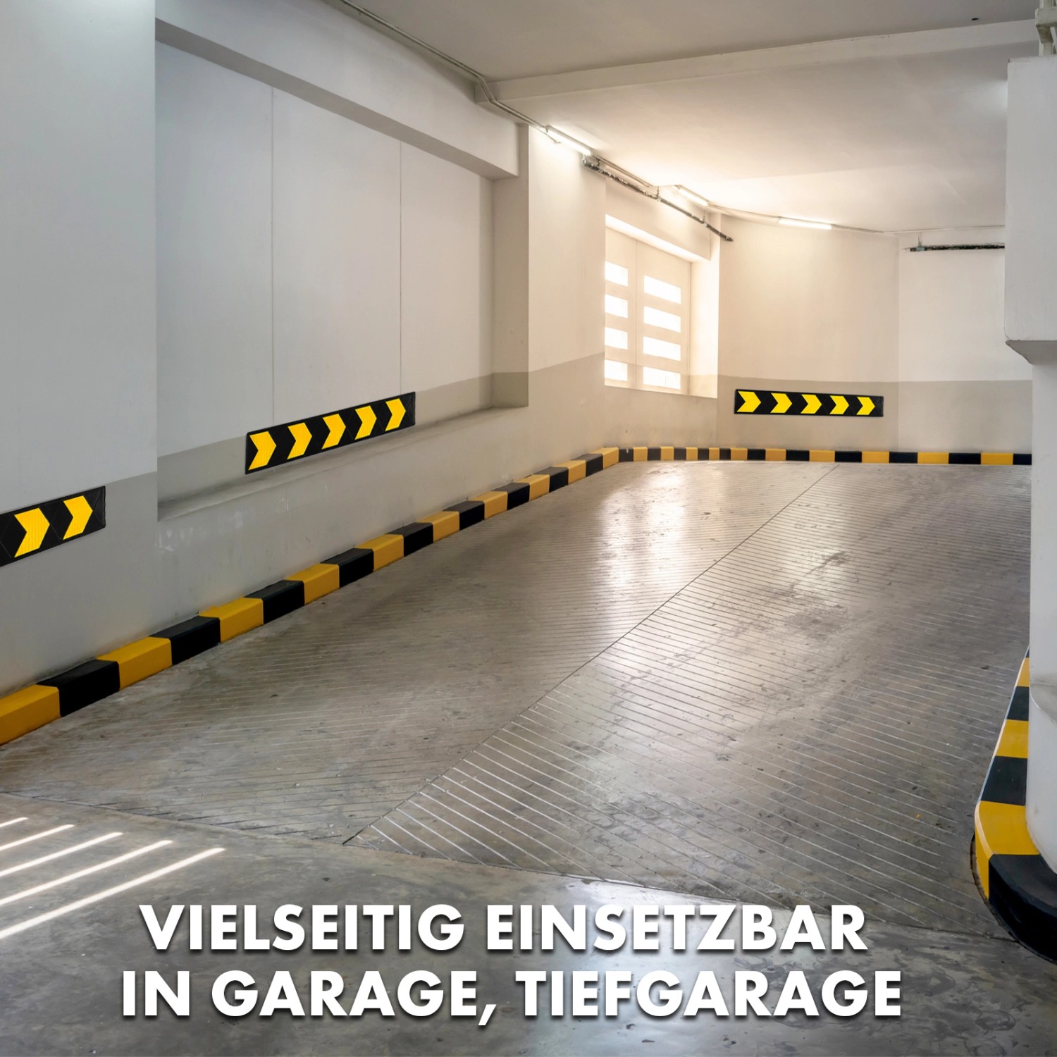 KARAT Wandschutz Aoraki in Garage: Schwarz-gelber Rammschutz mit Pfeilen an Wand und Boden.