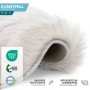 Flauschiges, elfenbeinfarbenes KARAT Kunstfell Nelly, Dekofell mit gekettelten Saum und Lederoptik Rückseite.