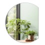 Tulup Wandspiegel, rund mit gerader Kante, reflektiert grüne Pflanzen im Raum. Modernes Design für Bad, Flur, Wohnzimmer.