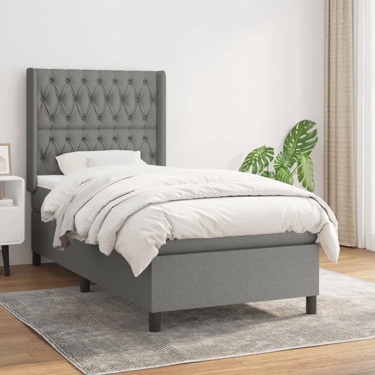Dunkelgraues vidaXL Boxspringbett (90x190 cm) mit Stoffbezug, inklusive Matratze und Kopfteil.