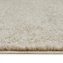 Detailansicht des beigen Andiamo Teppich Chia (60x110 cm) mit hohem, flauschigem Flor.