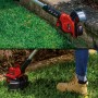 Einhell Akku-Rasentrimmer GE-CT 18/28 Li-Solo im Einsatz zum Trimmen von Rasenkanten.