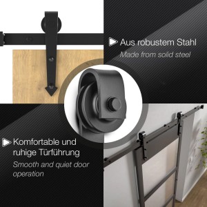 SOTECH ARROW Rollen Set für Schiebetüren, schwarz, aus Stahl. Zeigt 70mm Laufrollen an Holztür und montiertes System.
