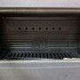 Brennraum des Plamen Gusskaminofen Authentic 50 mit Herdplatte, Detailansicht.