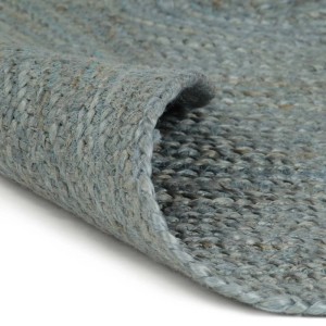 Detailansicht: Handgefertigter, runder Juteteppich in Oliv, 240 cm Durchmesser.