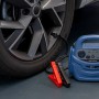 Cartrend Energiestation 12V mit Starthilfekabel und Reifenventiladapter am PKW-Rad.