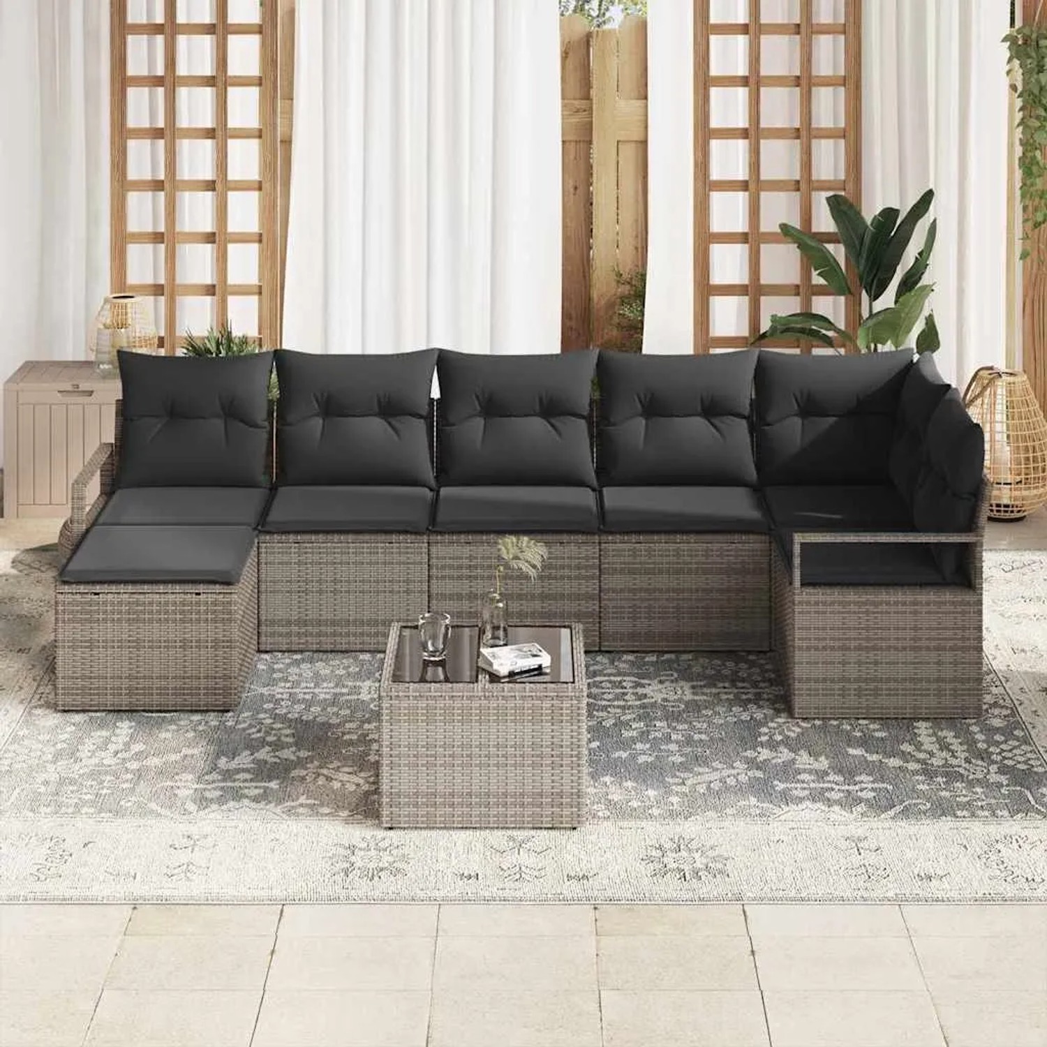 Graues 8-tlg. vidaXL Garten-Sofa-Set aus Poly Rattan mit Tisch und schwarzen Kissen.