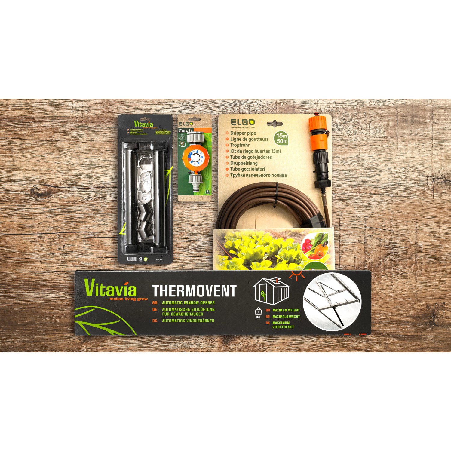 Zubehör für Vitavia Gewächshaus: Thermovent, Bewässerung und Fensteröffner für optimale Pflanzenzucht.