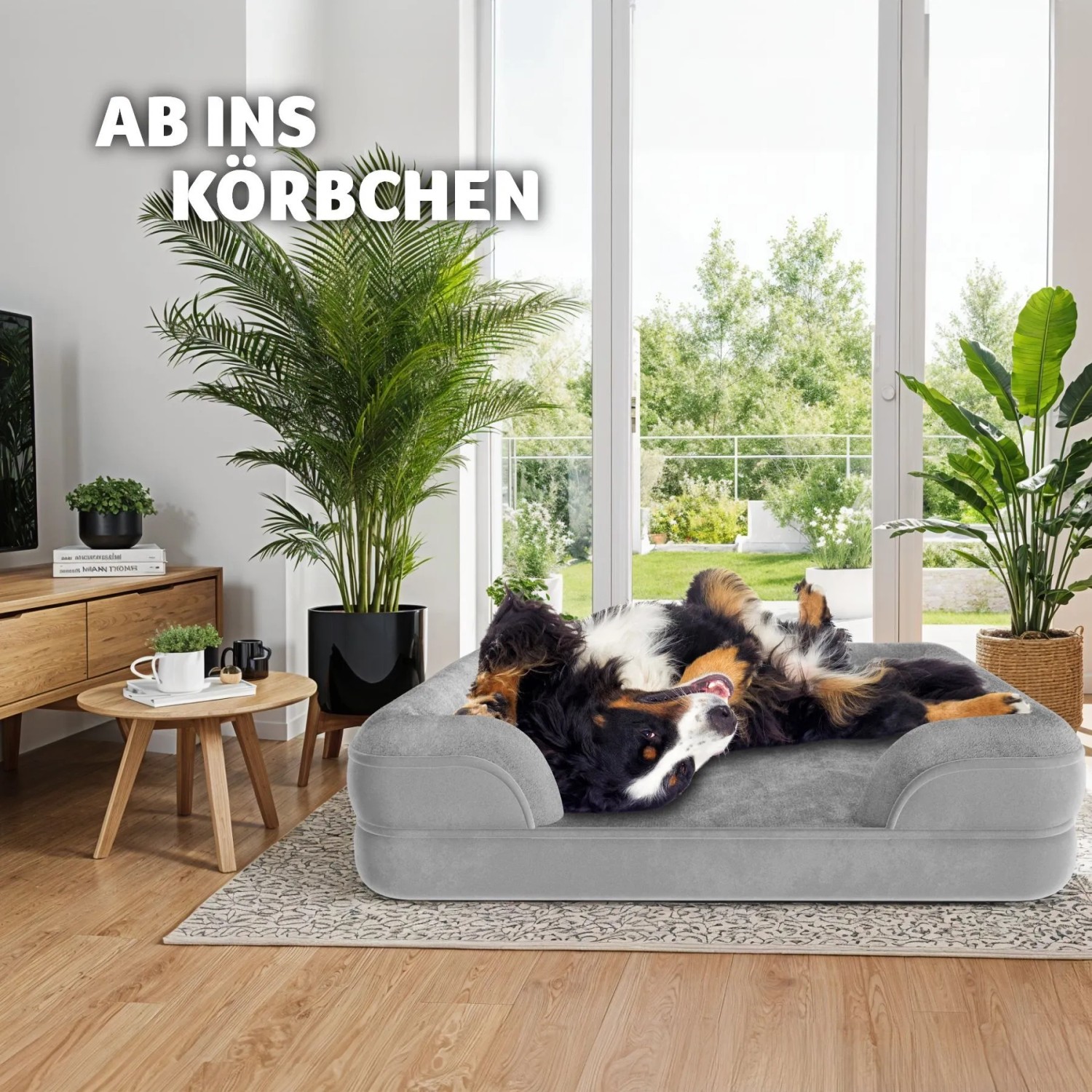 Graues Tectake Hundebett Kimba XL mit Hund darauf im Wohnzimmer.