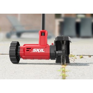 Skil Akku-Fugenreiniger 0660CA (ohne Akku/Ladegerät) in Rot/Schwarz bei der Arbeit.