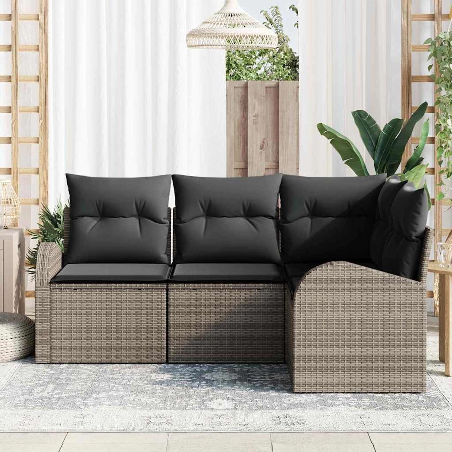 Graues 4-teiliges vidaXL Garten-Sofa-Set aus Polyrattan mit Kissen.